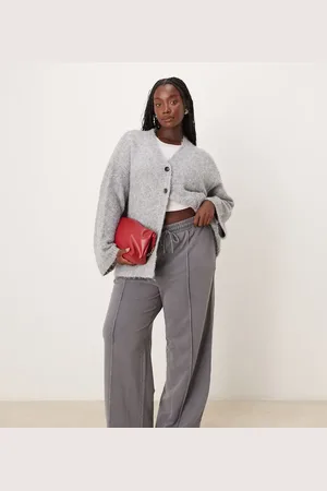 New Look New Look Curve - Joggingbroek met wijde pijpen en plat gestikte plooien in donkergrijs