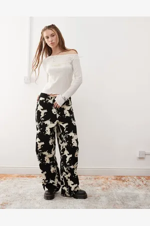 COLLUSION Baggy broek van koeienprint