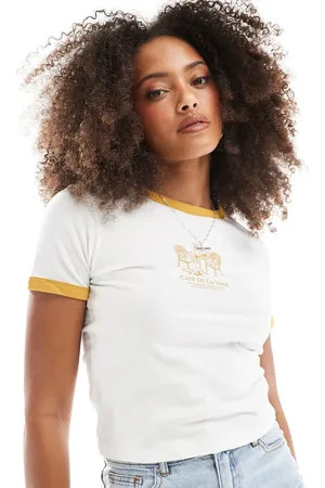 Vans T-shirt met gekleurde randjes en De La -print in marshmallow