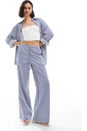 EDITED the label Ruimvallende gestreepte broek in blauw, deel van co-ord set