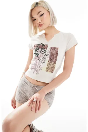 Reclaimed Top met inkeping in de hals en appliqué in ecru
