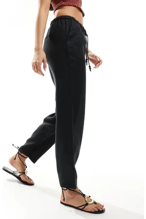 MANGO Linnen broek met gestrikte taille in