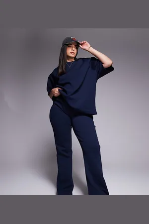 ASOS ASOS DESIGN Curve - Flare-joggingbroek met interlock-naden in marineblauw, deel van curve co-ord set