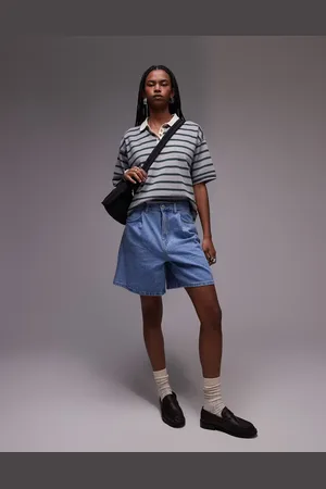 MANGO Ruimvallende denim shorts met lange pasvorm in lichtblauw
