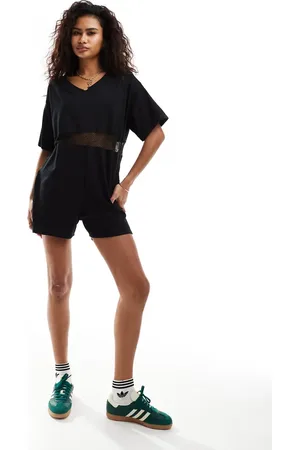 COLLUSION Boxy romper met V-hals en sportmesh-detail in