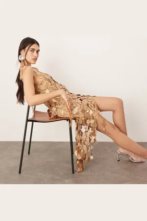 ASOS Doorschijnende asymmetrische mini jurk met kruismotief met lovertjes en franjes aan de zoom in brons