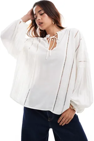 & OTHER STORIES Blouse met volumineuze mouwen, borduursels en gestrikte kraag in gebroken