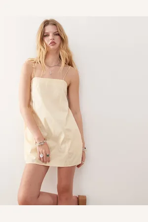 Monki Mini jurk van katoenen poplin met strikbandjes in botergeel