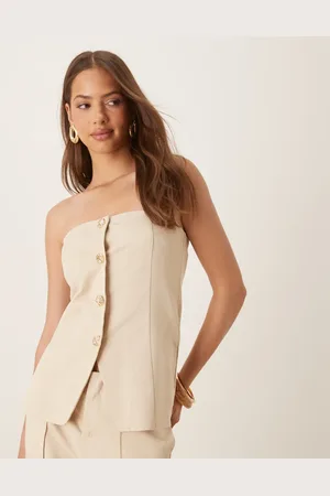 SNDYS Gilet met linnenlook, bandeau-hals, gouden knopen, split aan de voorkant en gestrikte achterkant in crème, deel van co-ord set