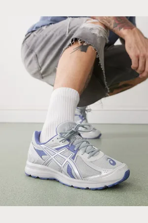 Asics Jog 100S - Sneakers in en zilver