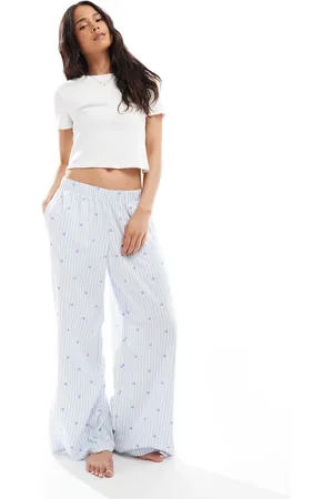 Hollister Nachtkleding - Baggy flanellen broekje met halfhoge taille en logo-tailleband in blauwe hartjesprint
