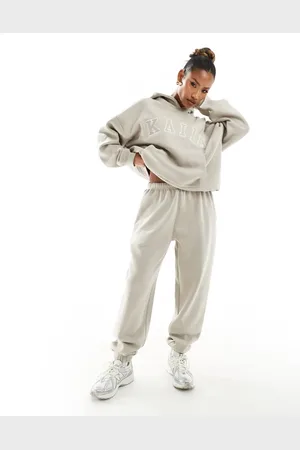 Kaiia Joggingbroek met aansluitende boorden in stone, deel van co-ord set