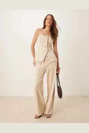 SNDYS Broek met linnenlook, naden aan de voorkant en wijde pijpen in crème, deel van co-ord set