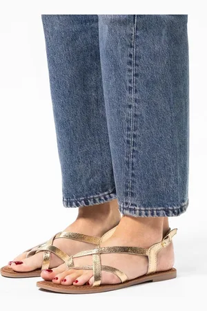 Sacha Dames - Gouden leren sandalen met gekruiste bandjes