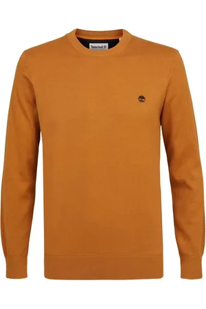 Timberland Sweater met een klassieke ronde geribde kraag, boorden en manchetten. De sweater is gemaakt van 100% biologisch katoen. Voorzien van een kenmerkend geborduurd ®-boomlogo in contrasterende kleur. - Oranje
