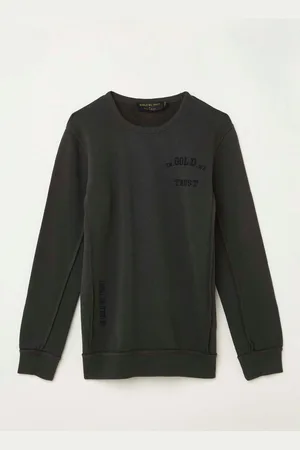 In Gold We Trust The Reakwon sweater met backprint en logo -