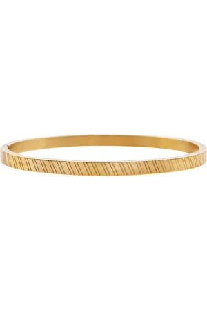 essentialistics Bangle armband schuine streepjes - Goudkleur - Stainless steel (verkleurt niet) - Kliksluiting