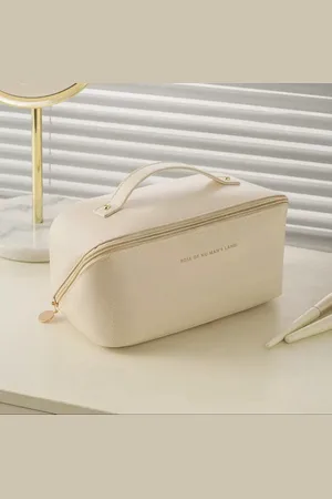 Merkloos Luxe Make-up Tas Beige + Beauty Blender Spons - Toilettas - Reistas - Tas Voor Toilet Artikelen - Beauty case - Cosmetica tas - Handige Make-up Tas - Make-up Organizer - Skincare Organizer - Reis Toilettas - Multifunctionele Make-up Tasje -