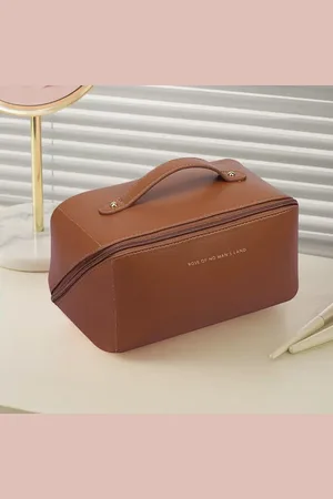 Merkloos Luxe Make-up Tas Bruin + Beauty Blender Spons - Toilettas - Reistas - Tas Voor Toilet Artikelen - Beauty case - Cosmetica tas - Handige Make-up Tas - Make-up Organizer - Skincare Organizer - Reis Toilettas - Multifunctionele Make-up Tasje -