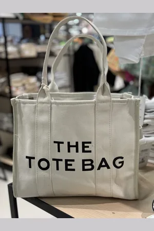 Merkloos Damestas. - The Tote Bag - - Zwarte letters - Canvas - 33 x 27 cm