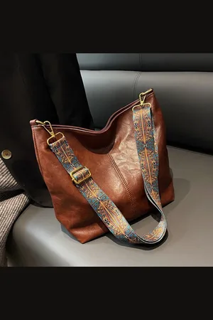 Merkloos Slingtas - crossbodytas - schoudertas - met mooie bagstrap