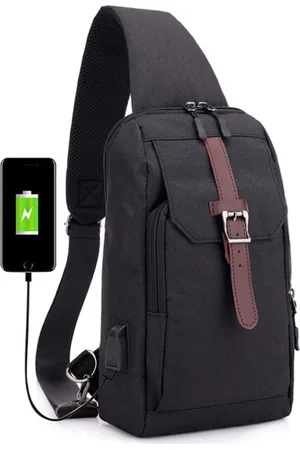 Merkloos Moderne Crossbody Bag! Zwarte schoudertas met USB-poort voor Opladen onderweg. Waterafstotend, Compact & Veilig, functioneel, stijlvol en comfortabel met extra brede schouderband. Jouw Ideale Reisgenoot