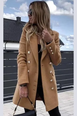 Merkloos Stijlvol de seizoensovergang in – Mid-Length Trenchcoat