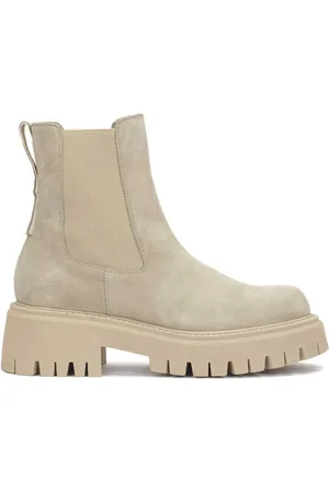 Kazar Slip-on boots on a trefoil sole