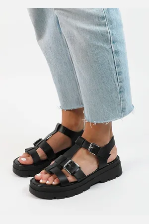 Sacha Dames - Zwarte leren plateau sandalen met goudkleurige buckles
