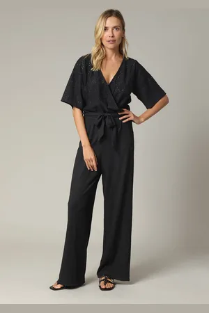 Deeluxe Zwarte crossover-jumpsuit voor dames met mooie mesh 36