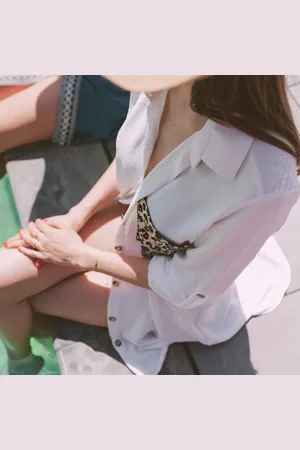Merkloos Witte blouse dames met panterprint