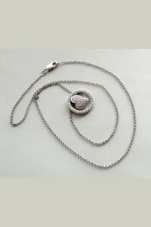 Christian Gouden collier met diamanten harten hanger