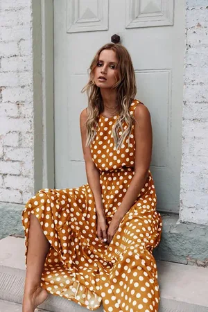 Merkloos BEELDIGE EXCLUSIEVE CLASSY JURK MET BOLLENPRINT LICHT ORANJE (M)