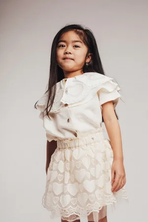baje studio Louen shortsleeve blouse creme oat | 86-92