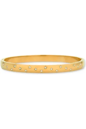 Marama Armband - Bangle Dames - stainless steel met gouden plating - ingegraveerde sterren met zirkonen - schuifsluiting - geschenkverpakking
