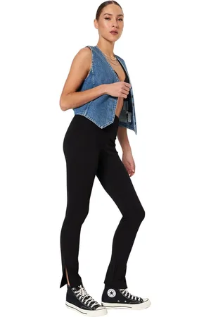 Trendyol Zwarte Elastische Gebreide Interlockbroek Met Splitten En Een Ribdetail Aan De Taille Twoaw22Pl0633.