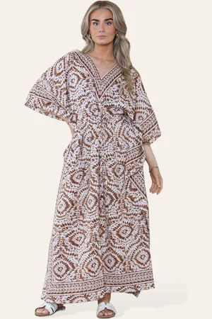 Merkloos Lange bohemian kaftan jurk Suzette wit V-hals one size M-XXL