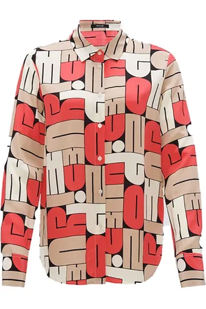 Opus De Blouse Fumira van is een stijlvolle dames blouse met een opvallend grafisch patroon