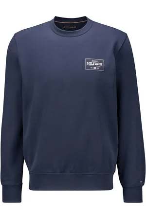 Tommy Hilfiger De Sweater Monotype Label van is een casual heren sweater, ideaal voor de winter