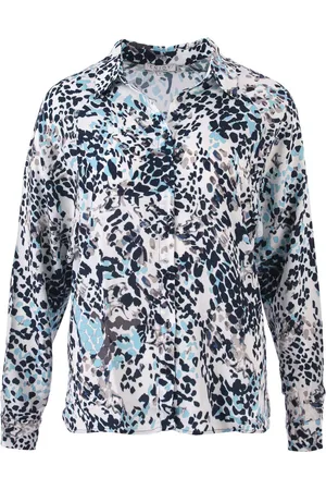 Enjoy De blouse raglan van , een dames blouse, is uitgevoerd in een stijlvolle panterprint met lange mouwen