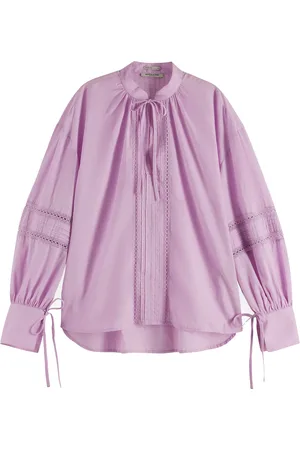 Scotch&Soda De Blouse Lace van is een elegante dames blouse lm met een losse pasvorm, ronde halslijn en lange mouwen