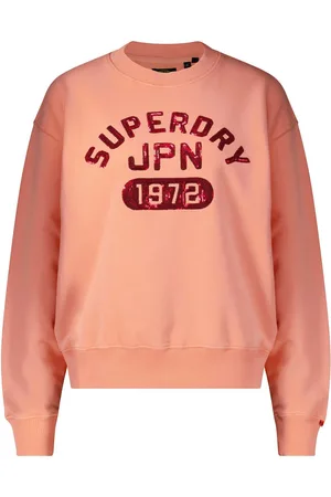 Superdry De Sweater embellished varsity van is een stijlvolle sweater met een relaxed pasvorm en een ronde hals