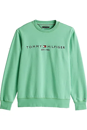 Tommy Hilfiger De Sweater Tommy Logo van is een casual heren sweater met een ribgebreid mouwboord en een ronde hals