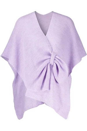 Bomont Dit stijlvolle poncho van , perfect voor casual gelegenheden, heeft een effen patroon en een comfortabele pasvorm