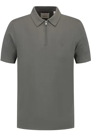 Dstrezzed De Polo Dorian Zip van is een stijlvolle heren polo met een opstaande kraag en ritssluiting