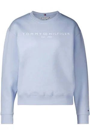 Tommy Hilfiger De Sweater Corp Logo van is een stijlvolle dames sweater met lange mouwen