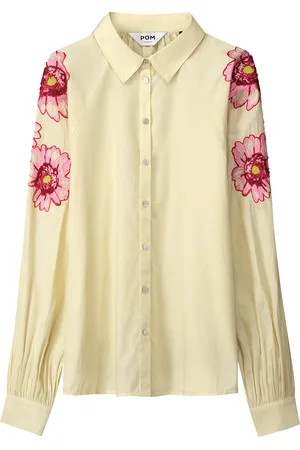 POM Amsterdam De Blouse Lexi Bouquet van is een elegante blouse met lange mouwen en een bloemenpatroon