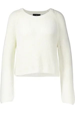 With Black De Pullover Indiana van is een stijlvolle dames trui met een minimalistisch design