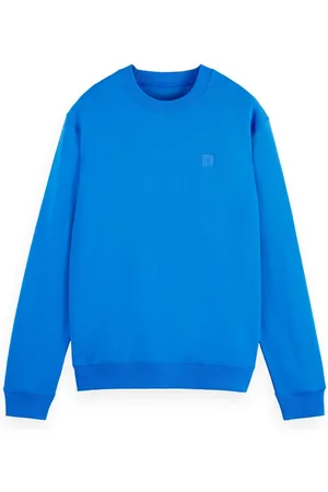 Scotch&Soda De trui Badge Logo van is een casual katoenen sweater met een ronde hals en ribgebreide mouwboorden