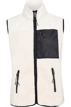 TheJoggConcept De Bodywarmer Berry van is een stijlvolle tussenjas met een sportief ontwerp